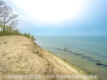 Approximately 9.4 Acre Parcel & Home on Bluff Overlooking Lake Michigan with 200′ of Private Beach, photo 11