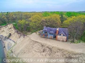 Approximately 9.4 Acre Parcel & Home on Bluff Overlooking Lake Michigan with 200′ of Private Beach, photo 2