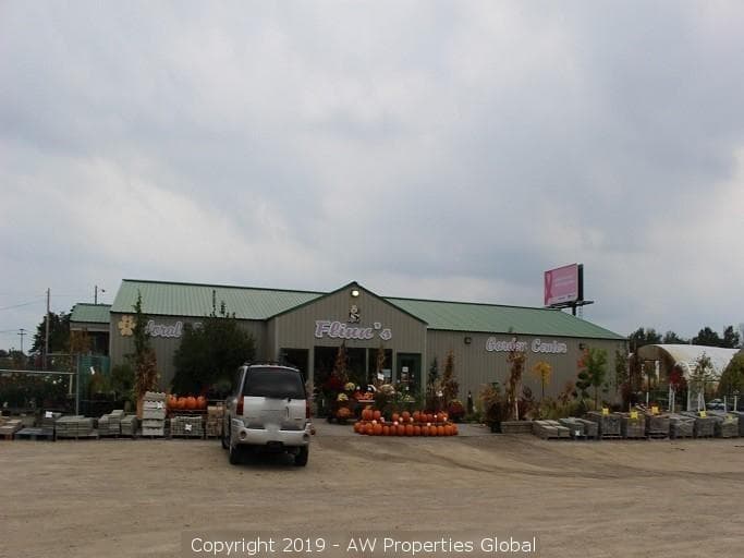 Approx. 3 Acres Commercial Zoned Land with 1 Building & 5 Greenhouses; Currently a Flower and Garden Center, photo 1